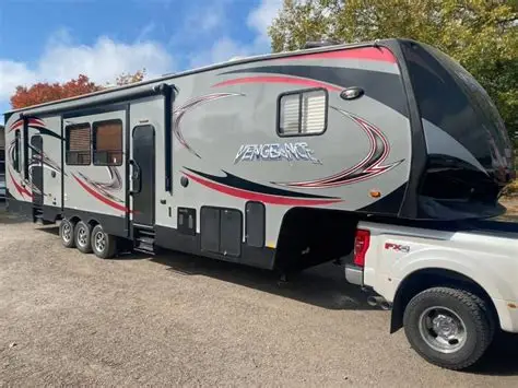 Travel trailer RV serviced by Titan Coach & Body